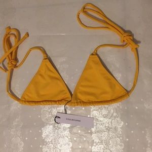 Selling a x-small Coulbourne BOA top NWT